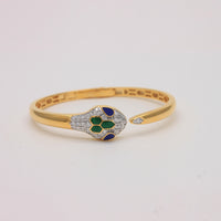 Enamel and Diamond Serpent Head Bangle.
