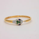 Enamel and Diamond Serpent Head Bangle.